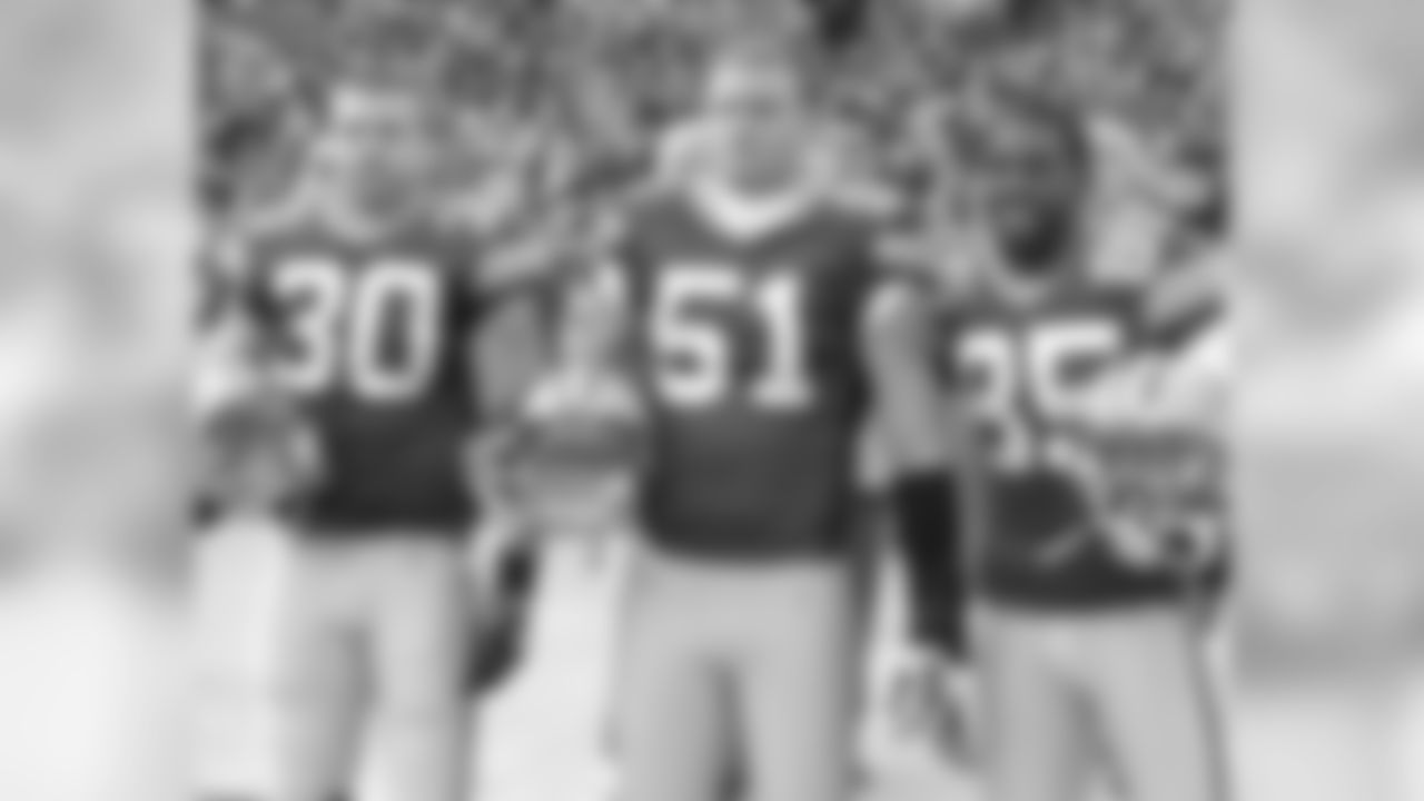 Captains John Kuhn, Brady Poppinga and Greg Jennings