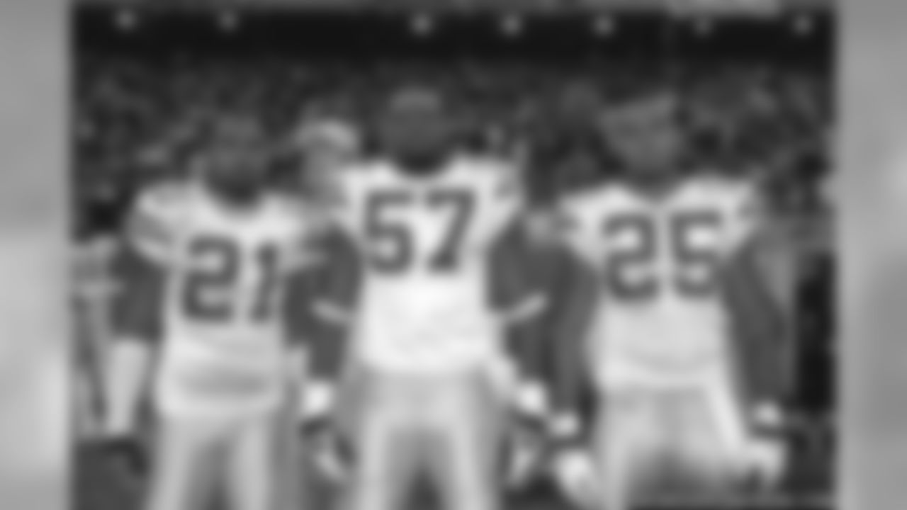 Charles Woodson, Jason Hunter and Ryan Grant