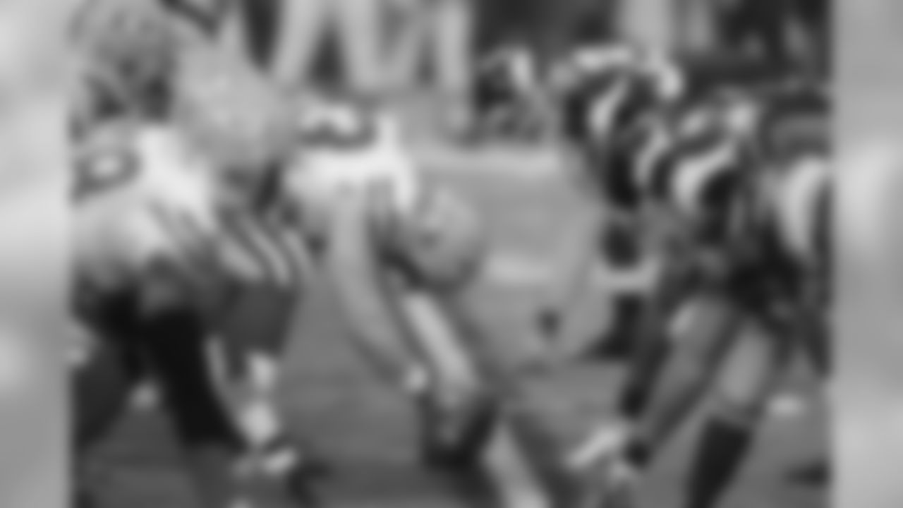 The line of scrimmage during the first half of an NFL football between the Minnesota Vikings and the Green Bay Packers Sunday, Oct. 23, 2011, in Minneapolis. (AP Photo/Andy King)