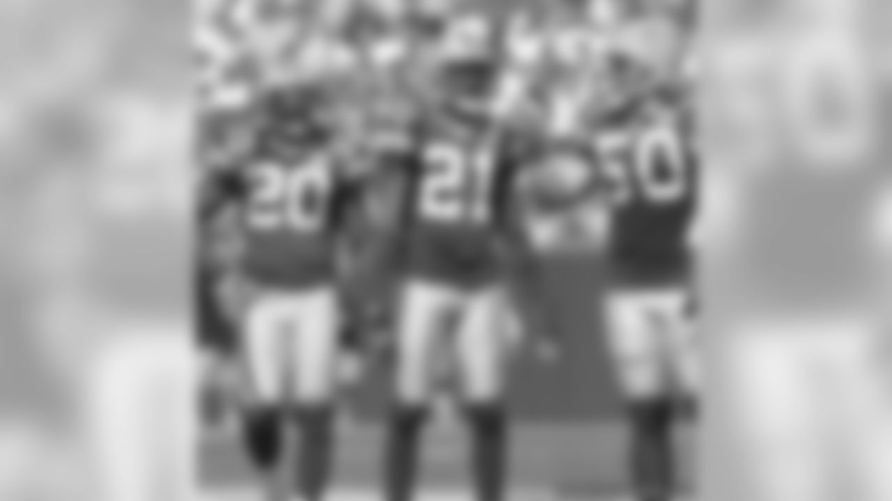 Atari Bigby, Charles Woodson and A.J. Hawk