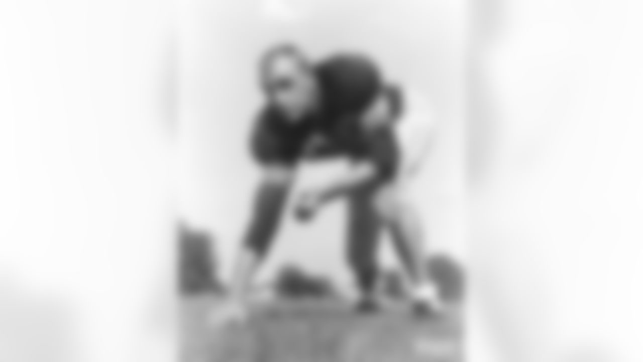 E Carlton Elliott (1952, 54)
