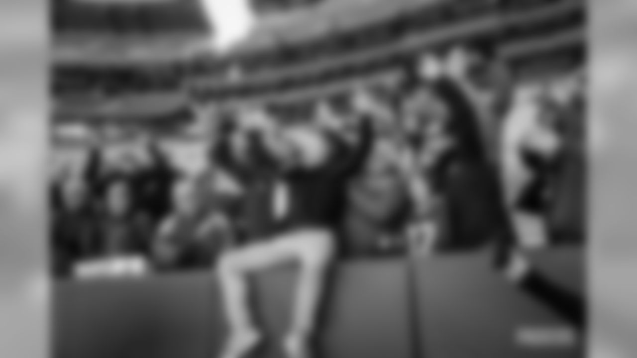 29 Packers fans attempt a Lambeau Leap at Lambeau Field on Saturday, Feb.29.