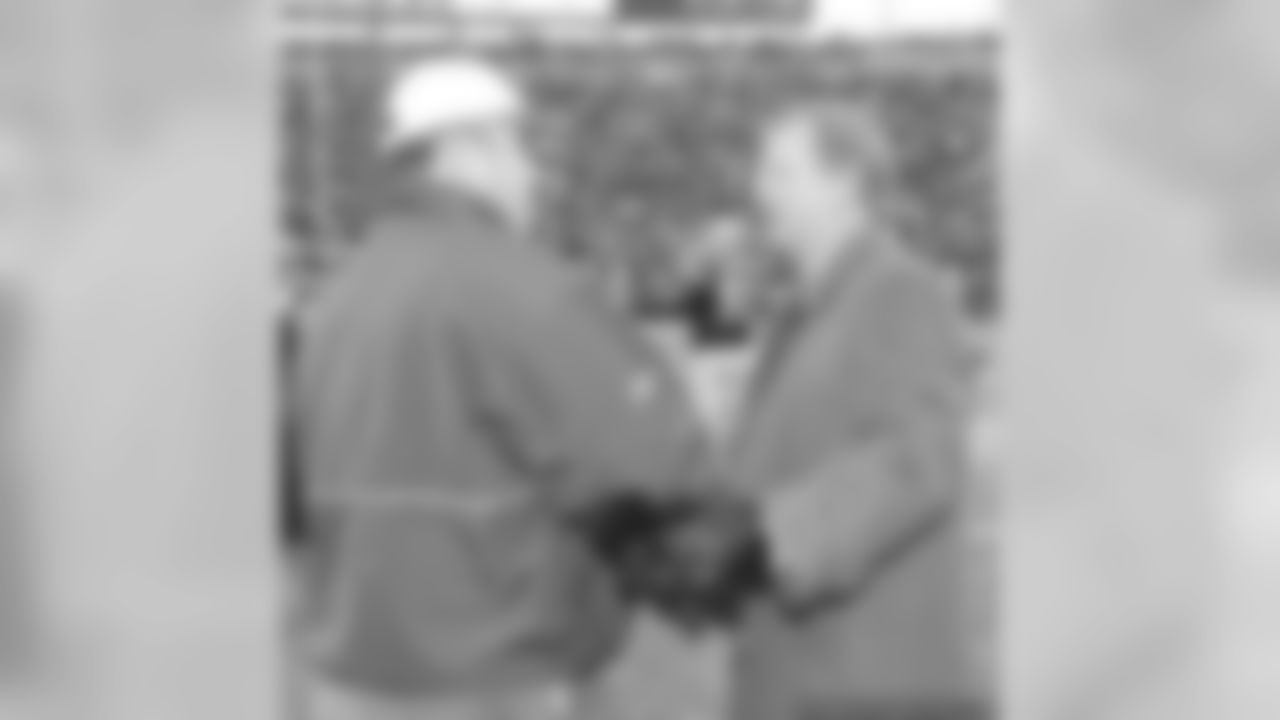 Mike McCarthy and Roger Goodell