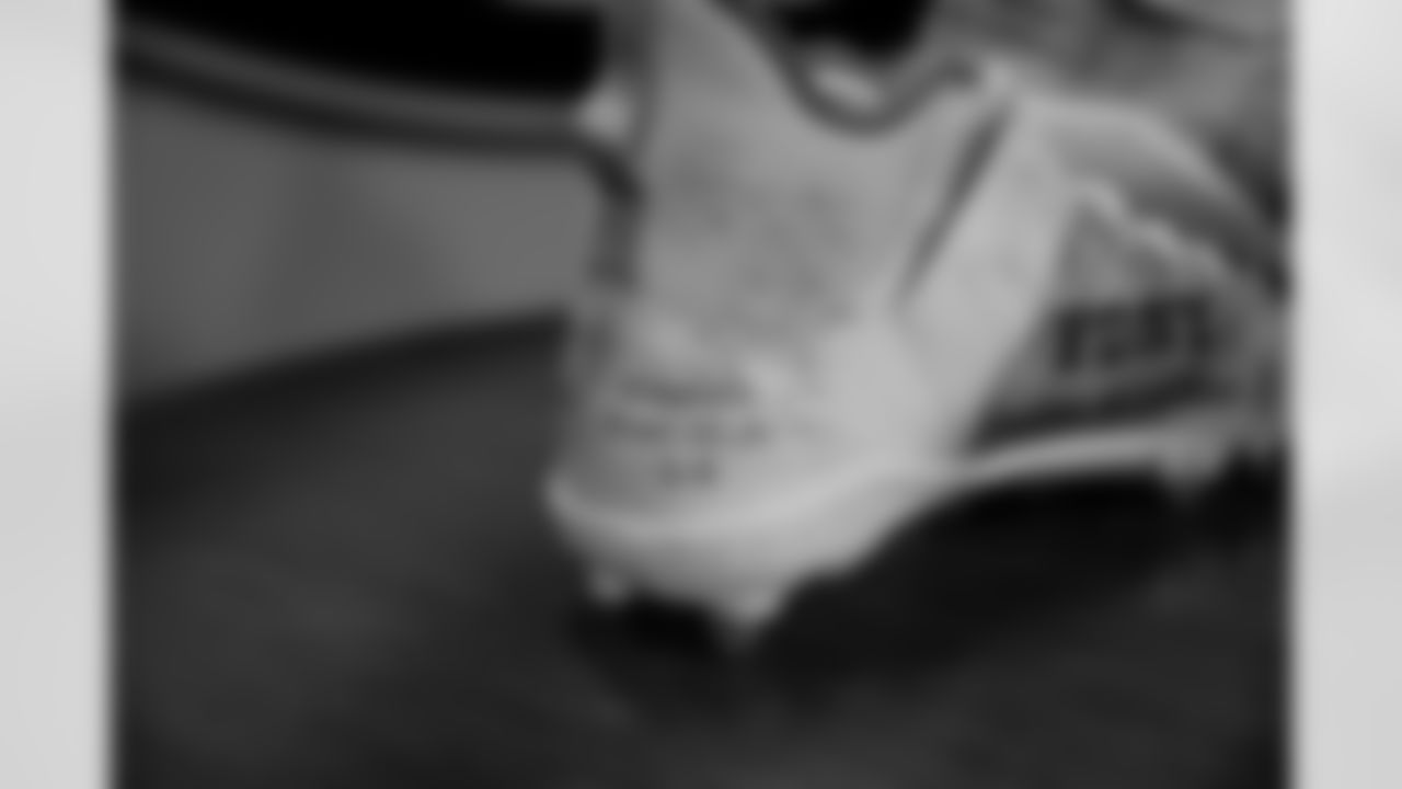 LB Ty Summers wearing TE John Lovett's cleats: Tunnel to Towers Foundation