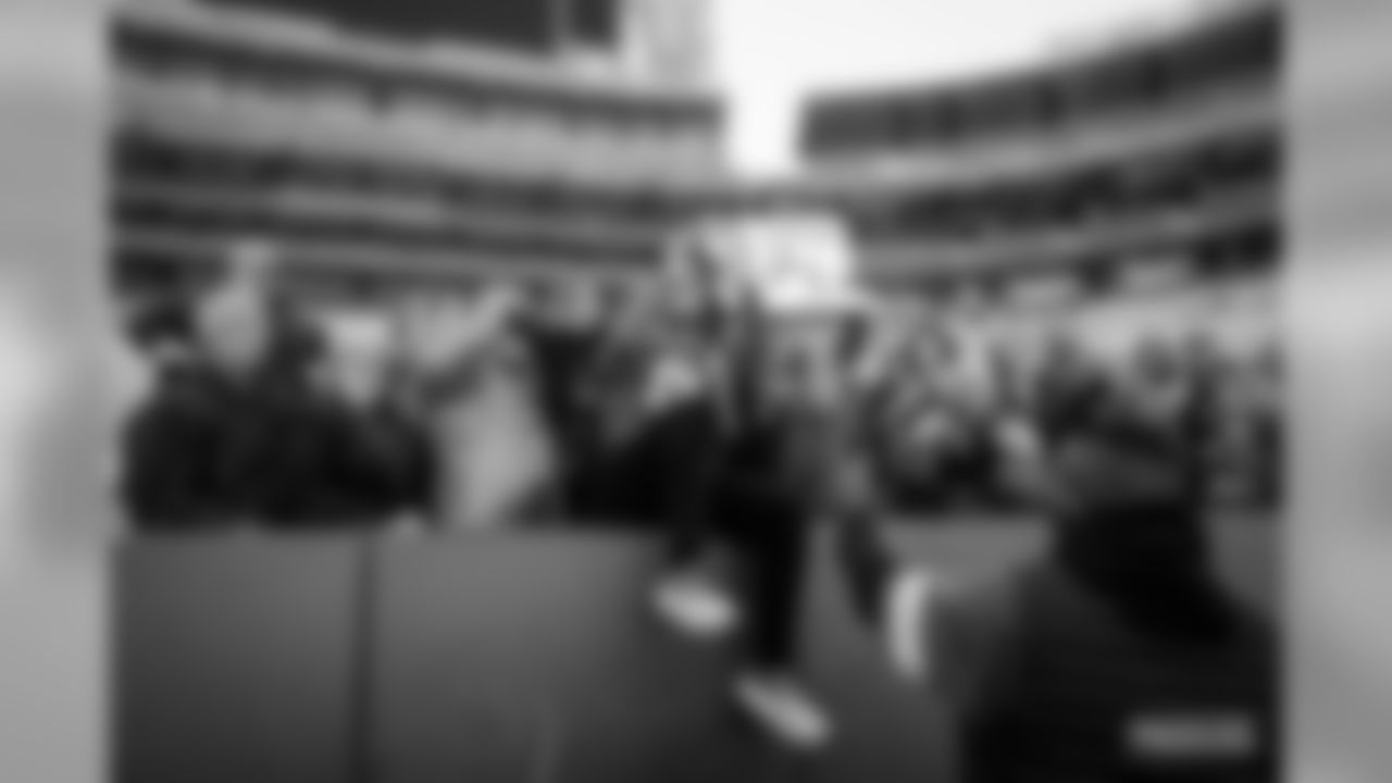 29 Packers fans attempt a Lambeau Leap at Lambeau Field on Saturday, Feb.29.
