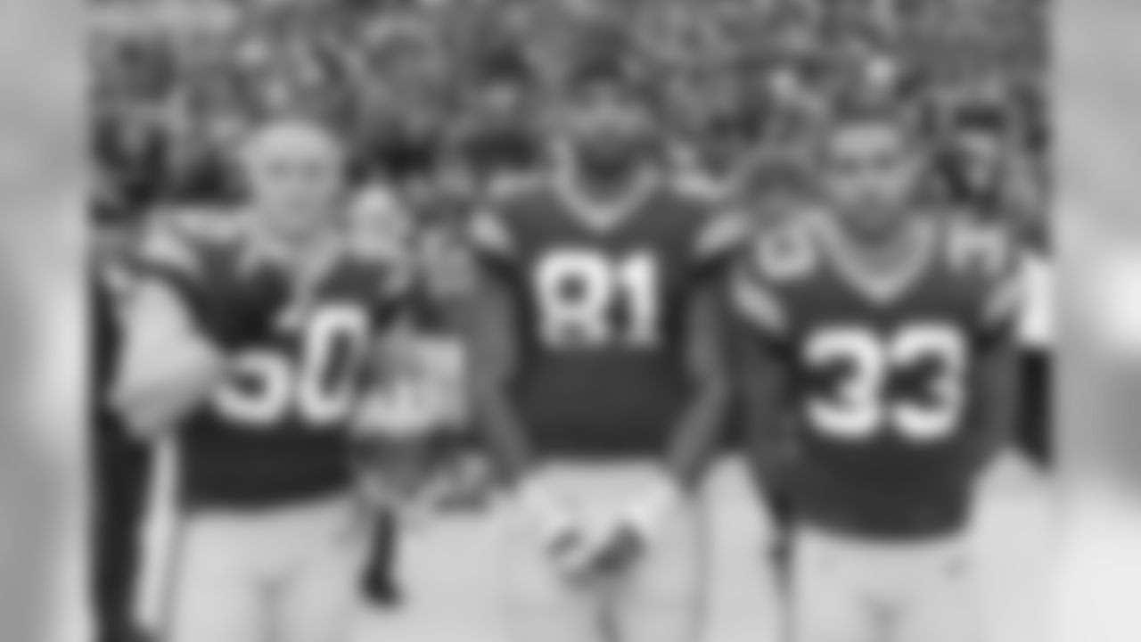 50 A.J. Hawk, #81 Andrew Quarless, #33 Micah Hyde