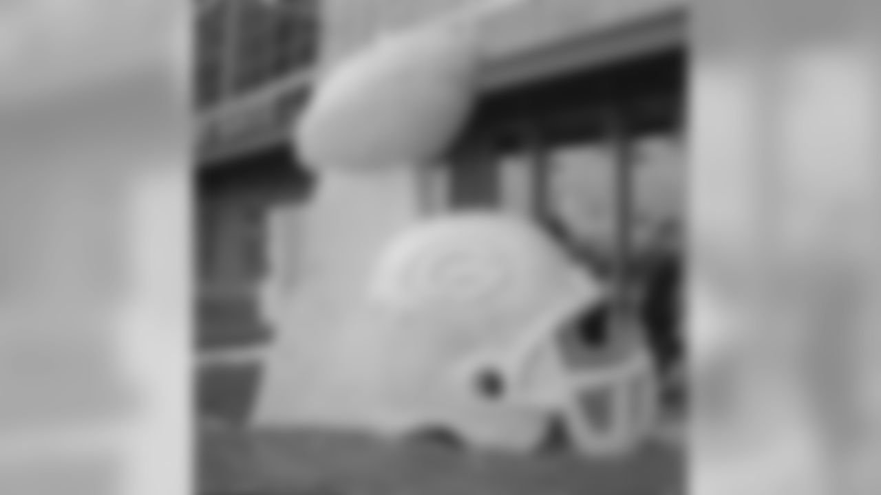 Snow Sculptures Take Shape At Lambeau Field