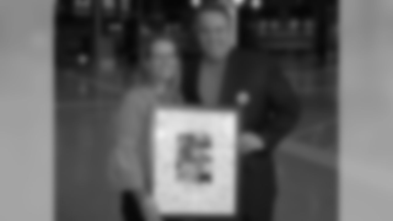 Traci Schneider, Autism Society of NE Wisconsin and Head Coach Mike McCarthy
