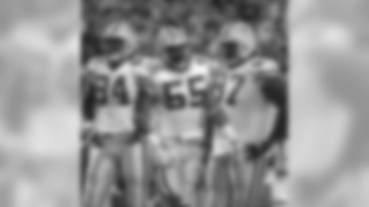 Kabeer Gbaja-Biamilla, Desmond Bishop and Johnny Jolly