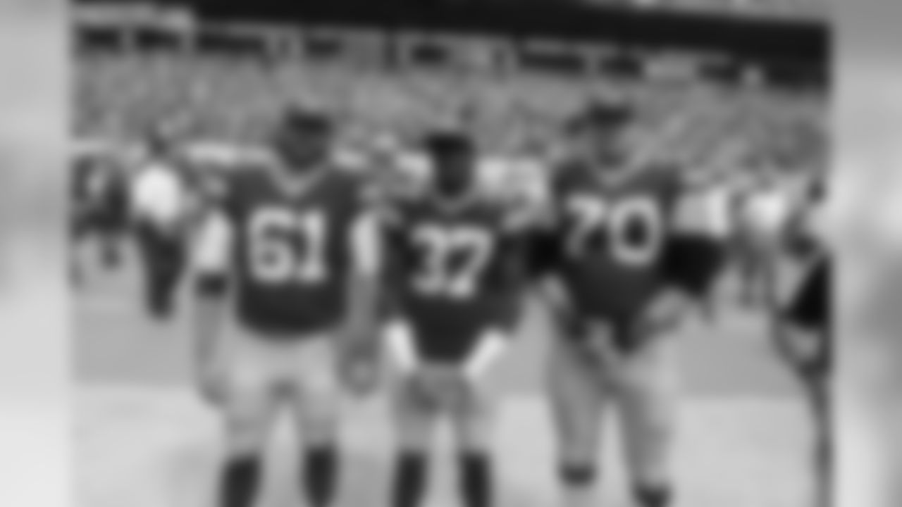 61 Brett Goode, #37 Sam Shields, #70 T.J. Lang