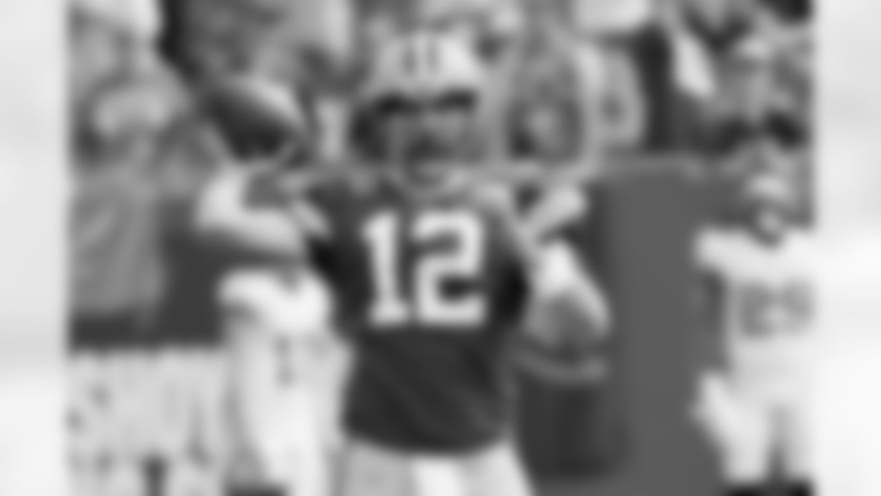 Green Bay Packers quarterback Aaron Rodgers (12) warms up before an NFL football game against the Tampa Bay Buccaneers Sunday, Sept. 25, 2022, in Tampa, Fla. (AP Photo/Jason Behnken)