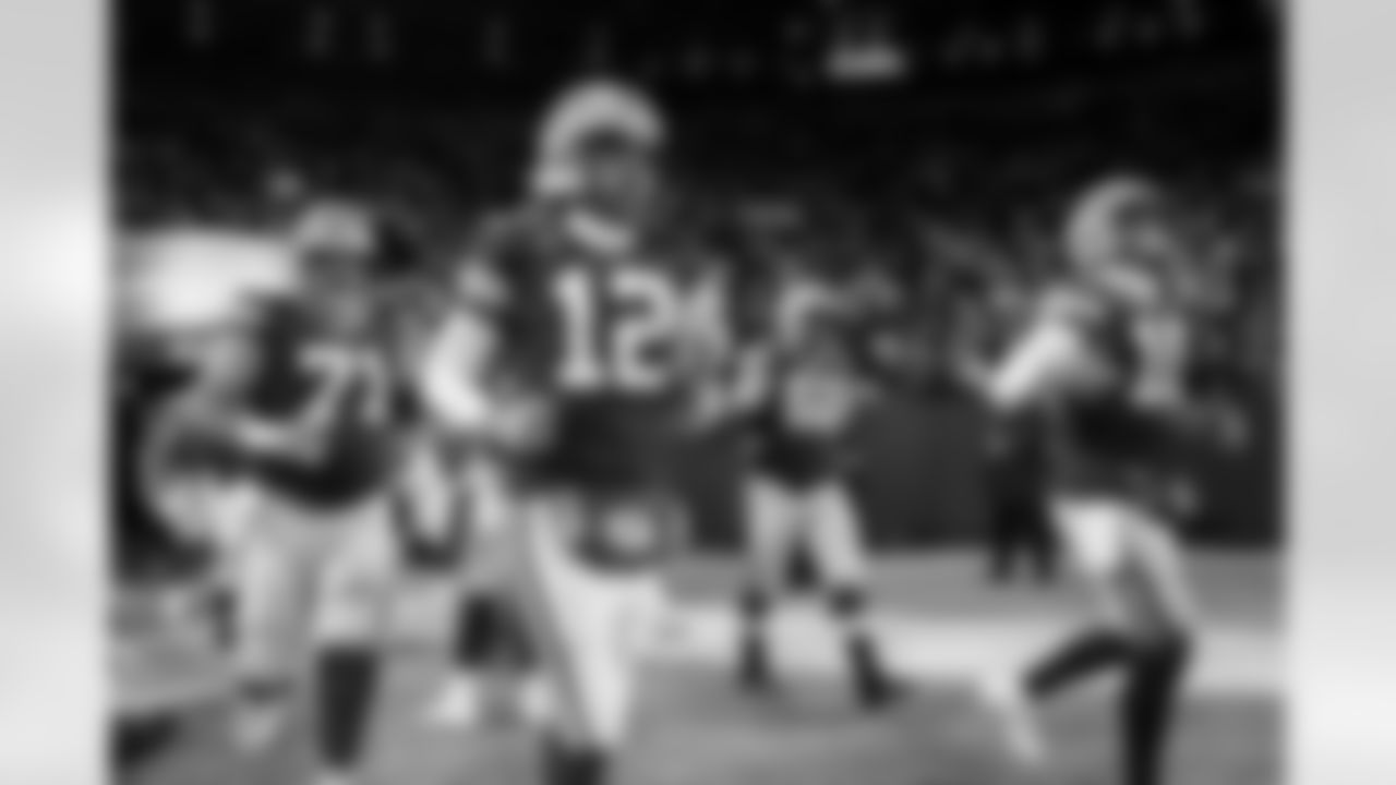 Green Bay Packers quarterback Aaron Rodgers (12) is seen running onto the field before an NFL Divisional Round playoff game against the San Francisco 49ers on Saturday, January 22, 2022 in Green Bay, Wisconsin. (Ryan Kang/NFL)