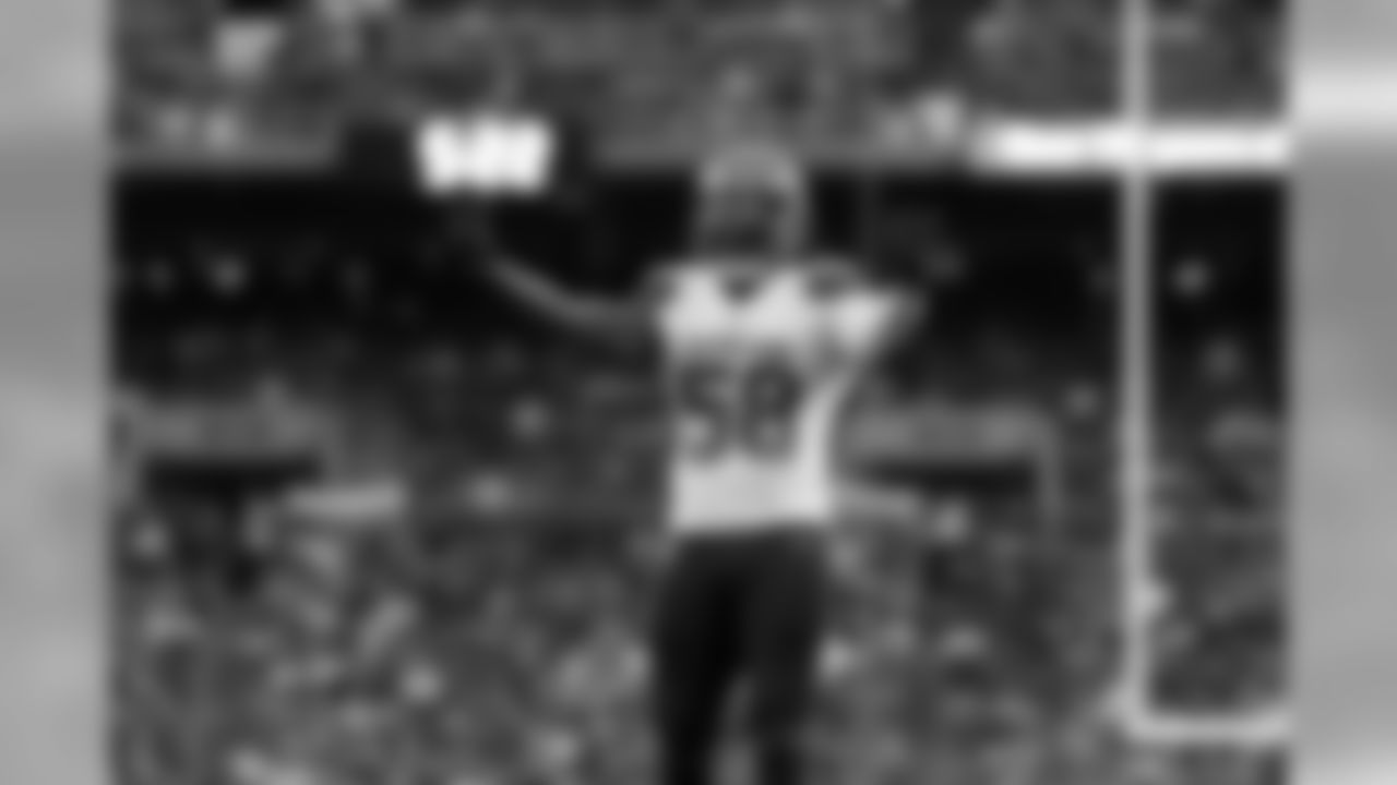 Cleveland Browns linebacker Christian Kirksey (58) celebrates during an NFL preseason football game against the Buffalo Bills, Friday, Aug. 17, 2018, in Cleveland.