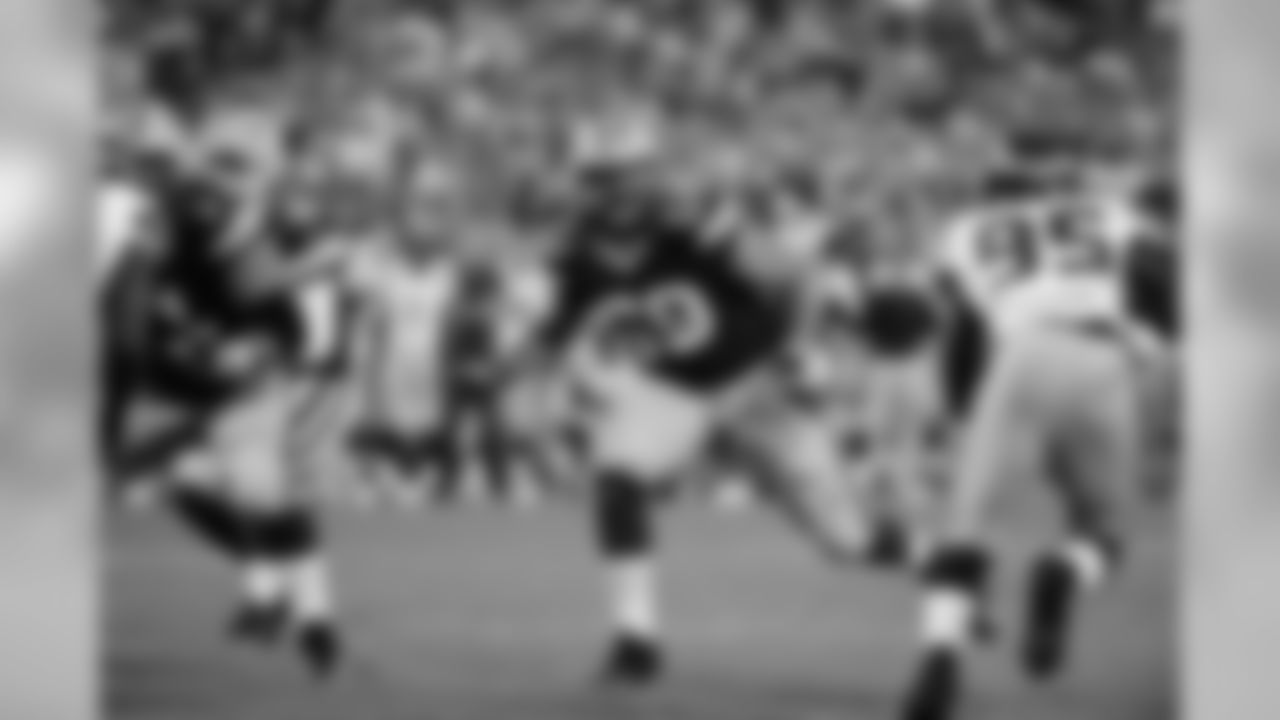 A rookie left tackle against the "Smith Brothers?" That's too daunting of a challenge for a guy in his pro debut to address without the help of a tight end or running back.