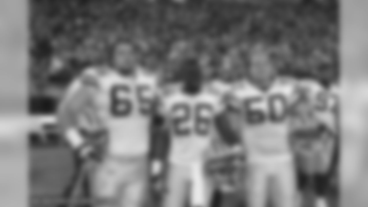 Mark Tauscher, Charlie Peprah and A.J. Hawk