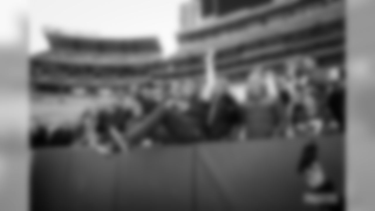 29 Packers fans attempt a Lambeau Leap at Lambeau Field on Saturday, Feb.29.