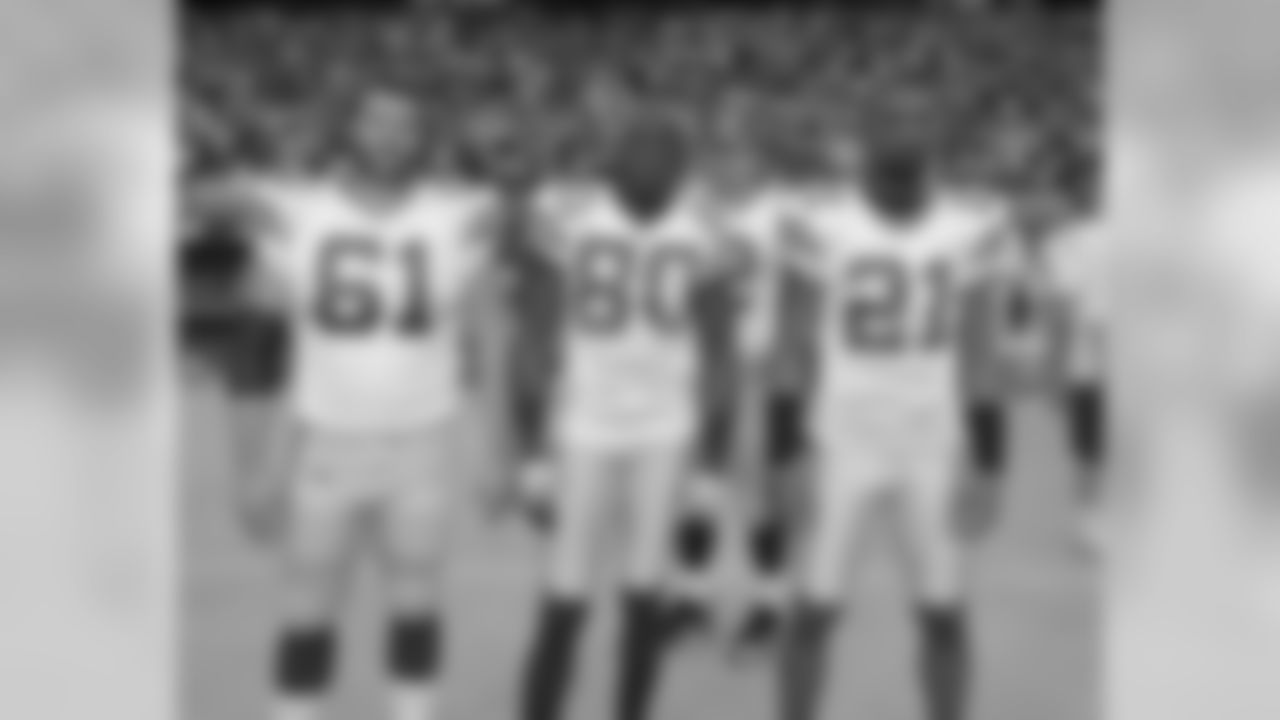 Team Captains Brett Goode, Donald Driver, Charles Woodson
