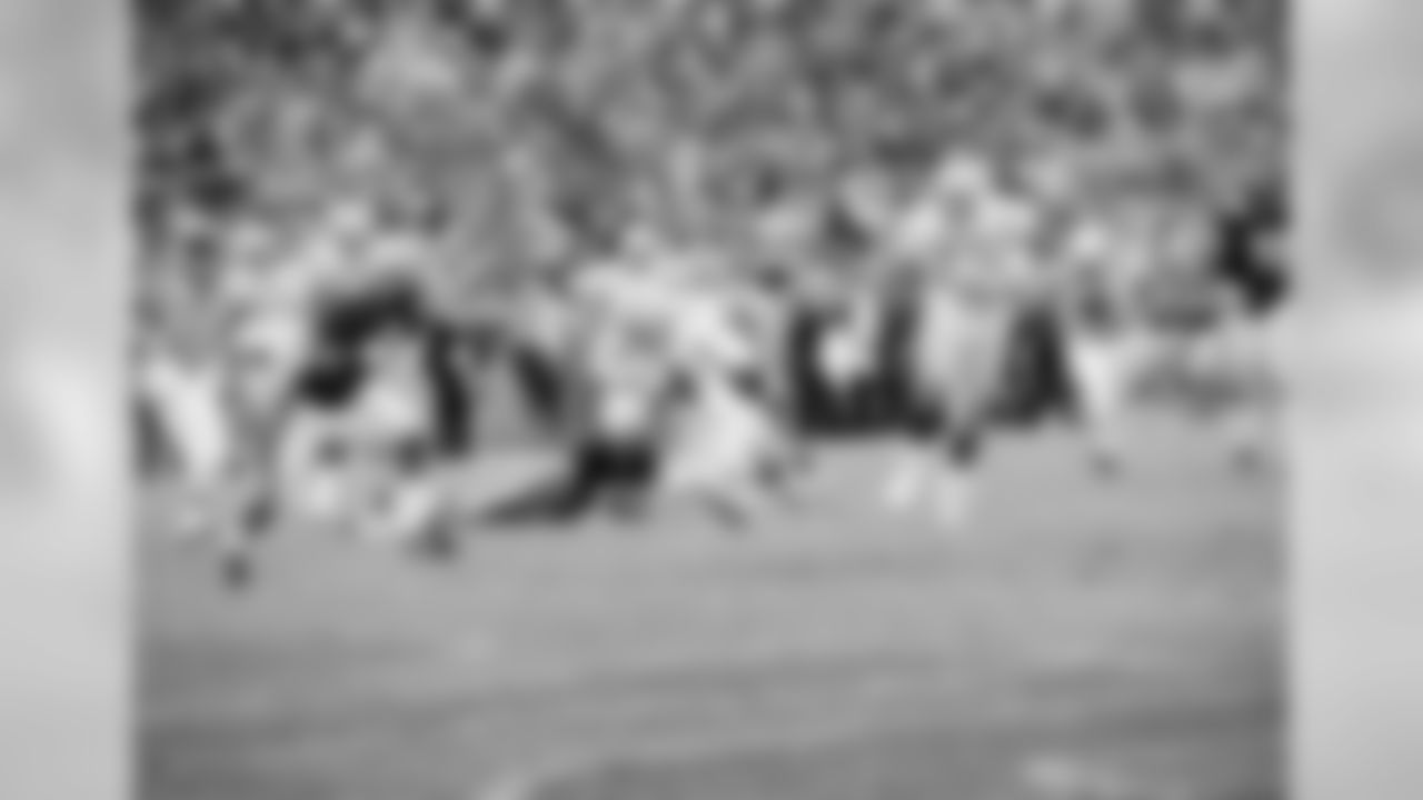 Nov. 23, 1992 QB Brett Favre dives for a fourth-quarter touchdown as Bears S Mark Carrier arrives too late. The Packers won, 17-3, as Brett Favre got his first career win over the Bears.