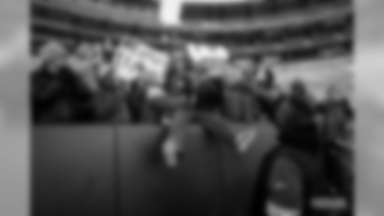 29 Packers fans attempt a Lambeau Leap at Lambeau Field on Saturday, Feb.29.