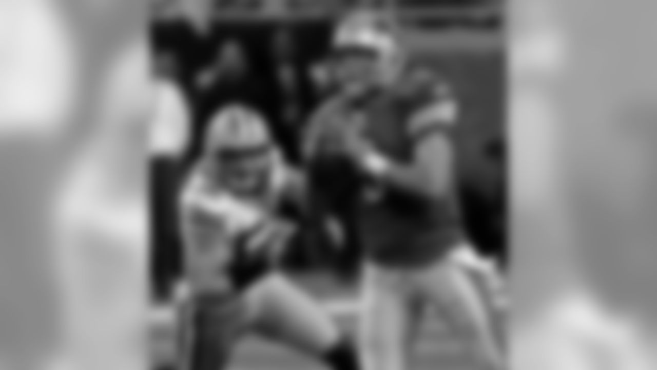 Nov. 26, 2009 - OLB Clay Matthews (52) pressures QB Matthew Stafford (9) during the first half. The Packers won, 34-12. Matthews finished the 2009 season leading the team with 10 sacks.