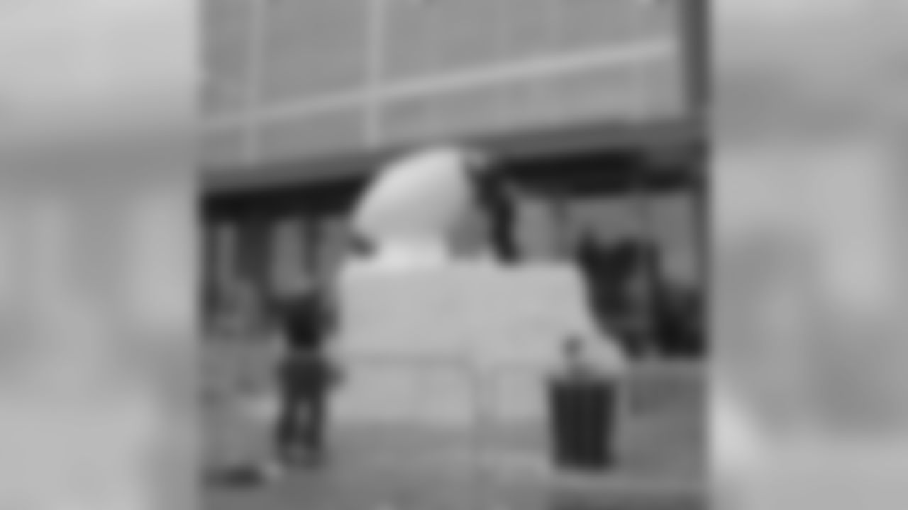 Snow Sculptures Take Shape At Lambeau Field