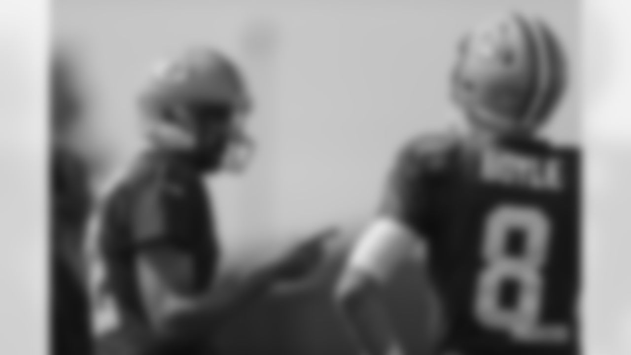 Quarterbacks Aaron Rodgers and Tim Boyle