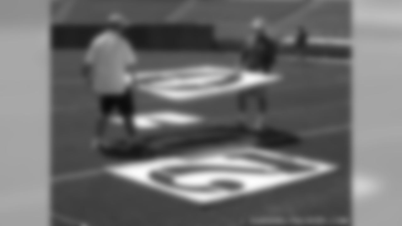 Packers Field Crew Makes Preparations For Family Night