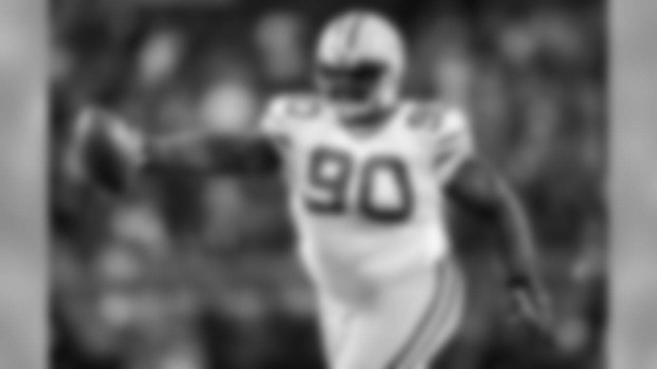 Jan. 23, 2011 - DT B.J. Raji reacts after intercepting and running the ball back for a touchdown against the Bears during the second half of the NFC Championship game in Chicago.