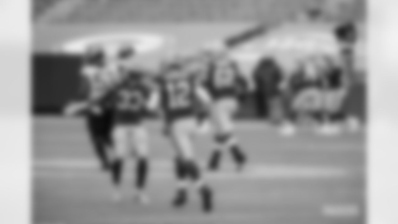 RB Aaron Jones and QB Aaron Rodgers