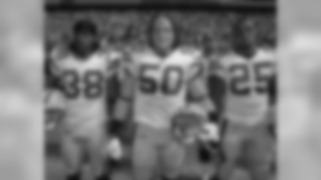 Captains Tramon Williams, A.J. Hawk and Ryan Grant