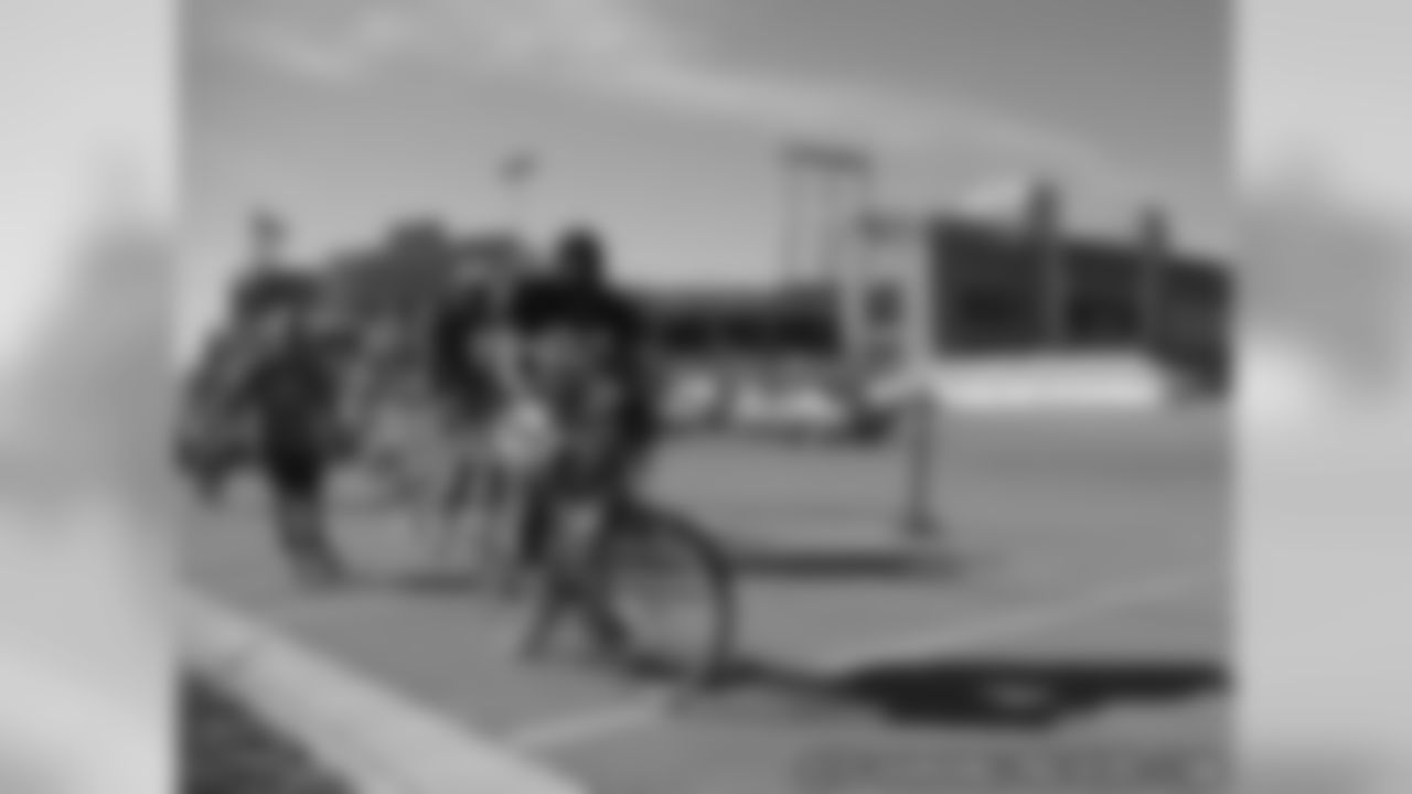 Bills Ride Bikes To Meet Packers At Practice