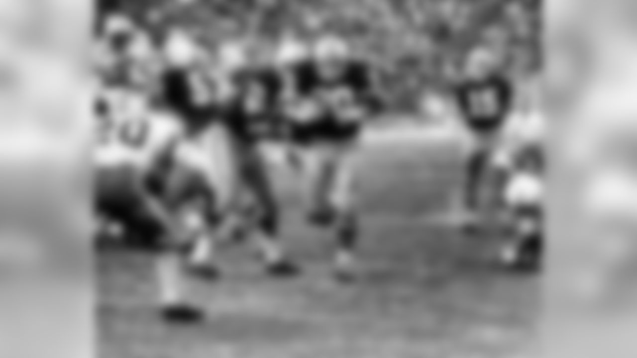 Dec. 31, 1967 - QB Bart Starr (15) hands off to RB Donny Anderson (44) during the 1967 NFL Championship. The Packers beat the Cowboys, 21-17, at Lambeau Field. This game has been nicknamed "The Ice Bowl" as the game-time temperature at Lambeau Field was -13 degrees.