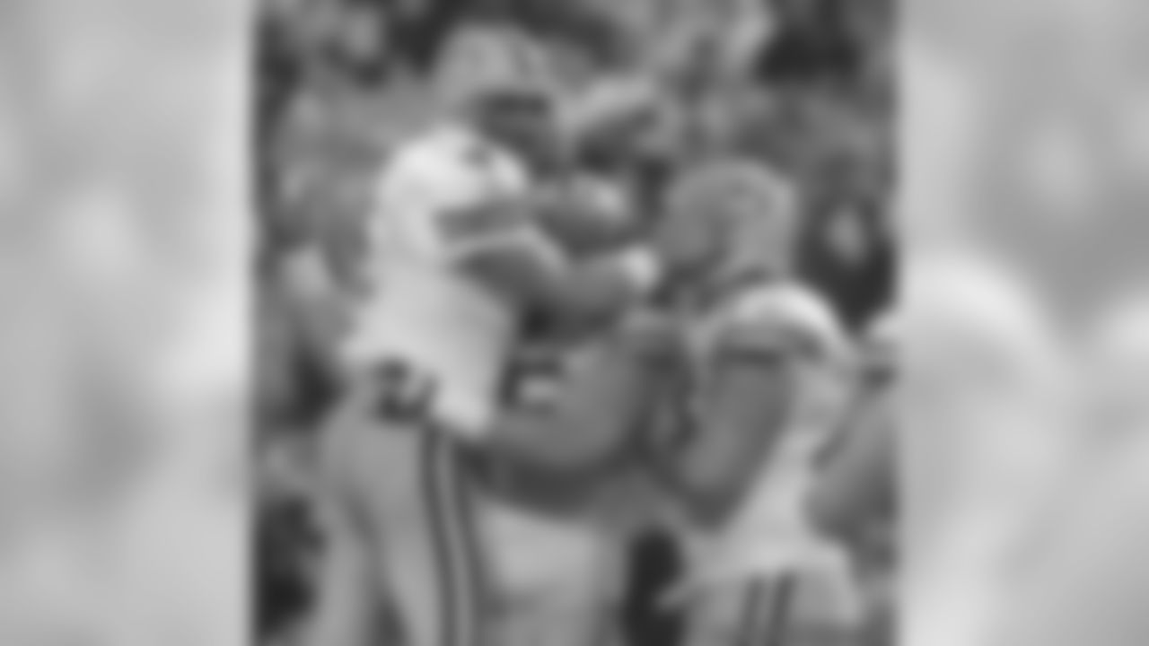 Brett Favre, Mark Tauscher and Daryn Colledge