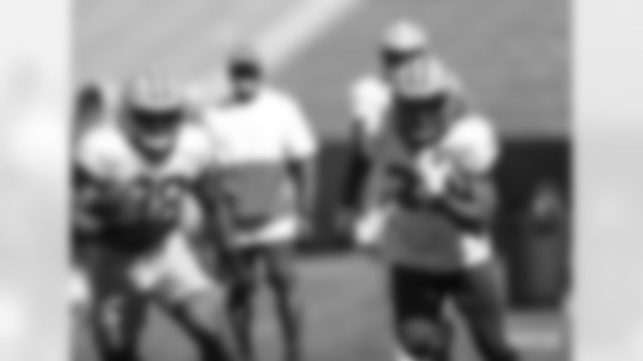 Running Backs AJ Dillon and Aaron Jones