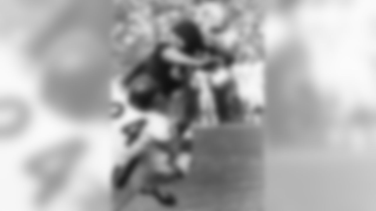 Sept. 21, 1969 - RB Jim Grabowski gets tackled by two Bears defenders on his way to the end zone. Grabowski finished the game with 16 carries for 85 yards, splitting rushes with Travis Williams. The Packers won, 17-0, with 50,861 in attendance at Lambeau Field.