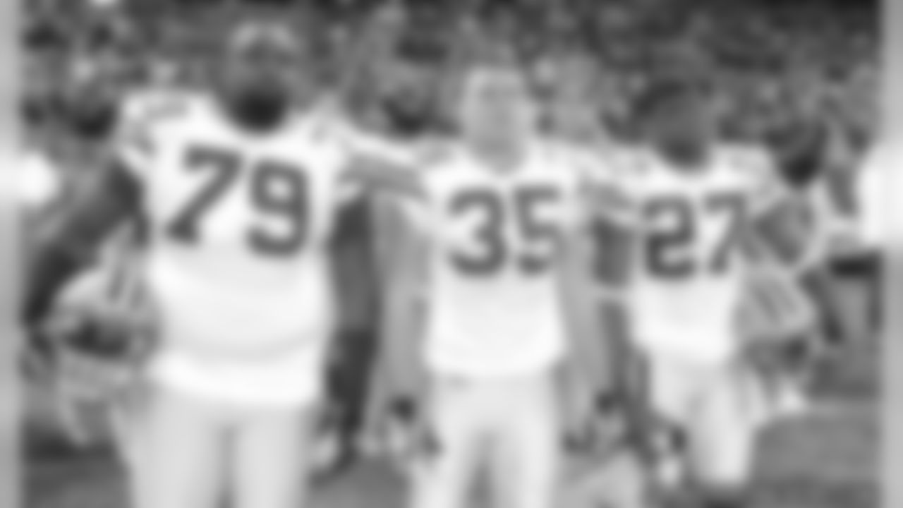 Ryan Pickett, Korey Hall and Will Blackmon
