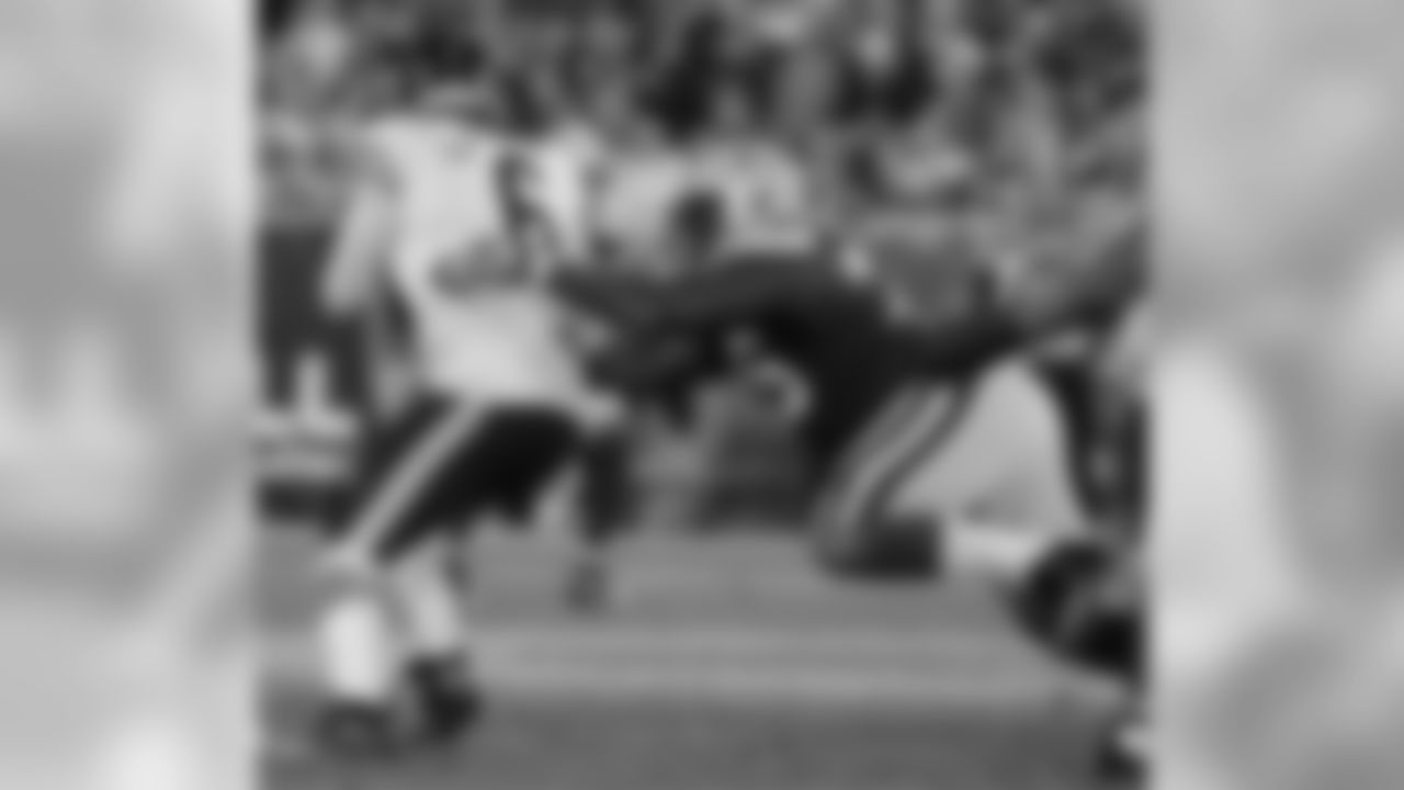Rookie DL Mike Daniels sacks Bears QB Jay Cutler for his first career sack. The Packers had seven sacks of Cutler in the game.
