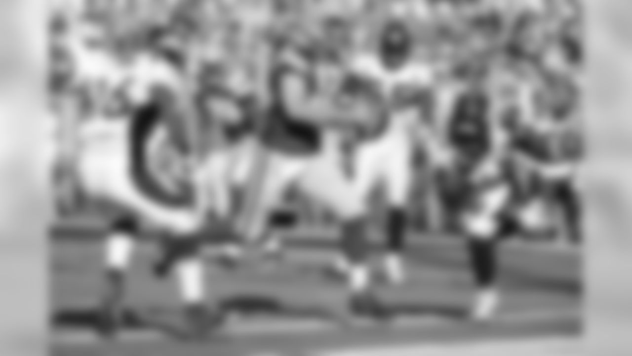 Became the first QB in NFL history to throw for more than 400 yards with four TD passes and two rushing TDs in one game.