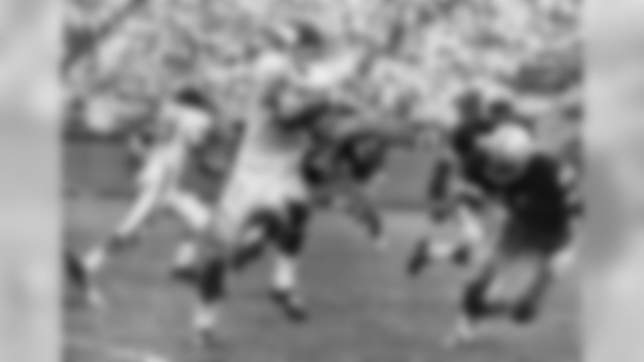 Oct. 29, 1961 - Packers DBs Jesse Whittenton (47) and Hank Gremminger (46) persue Vikings HB Hugh McElhenny (39) at Milwaukee County Stadium. The Packers beat the Vikings, 28-10, and won the NFL Championship that year vs. the New York Giants.