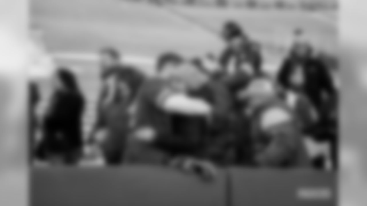 29 Packers fans attempt a Lambeau Leap at Lambeau Field on Saturday, Feb.29.