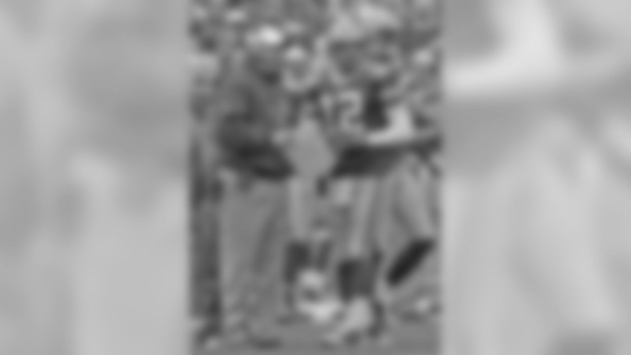 Oct. 5, 2008 - QB Aaron Rodgers and Head Coach Mike McCarthy talk during a timeout against the Falcons at Lambeau Field.