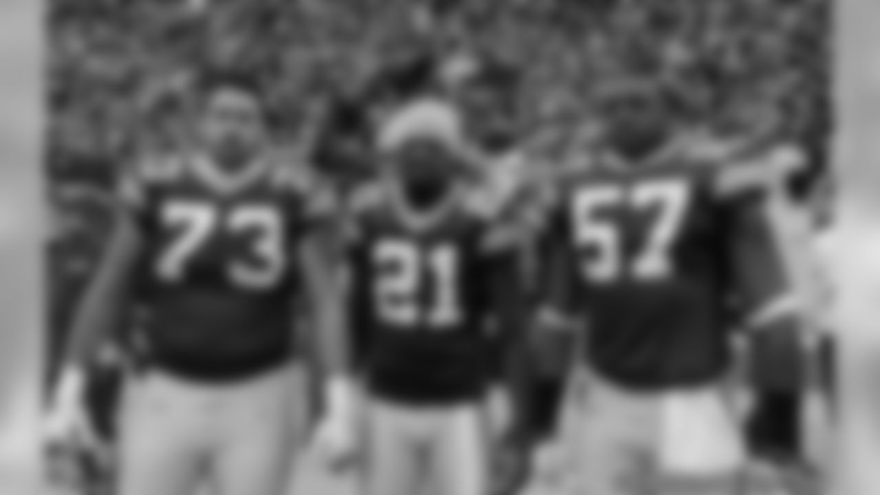 Captains Daryn Colledge, Charles Woodson and Jason Hunter