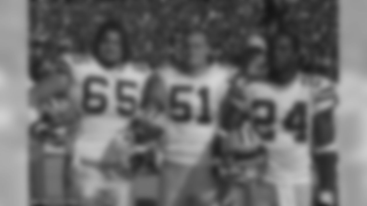 Mark Tauscher, Brady Poppinga and Jarrett Bush
