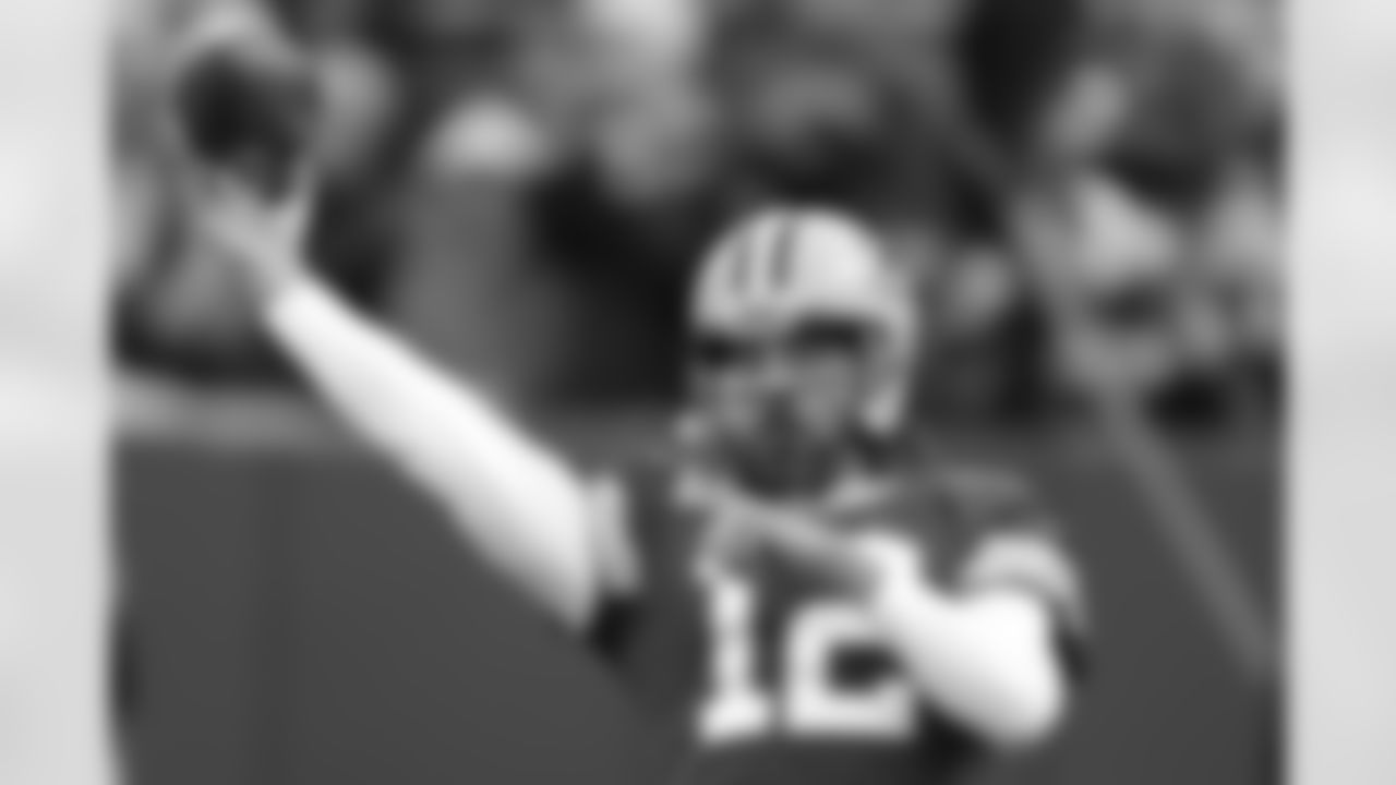 Green Bay Packers' Aaron Rodgers warms up before an NFL football game against the Seattle Seahawks Sunday, Nov. 14, 2021, in Green Bay, Wis. (AP Photo/Matt Ludtke)