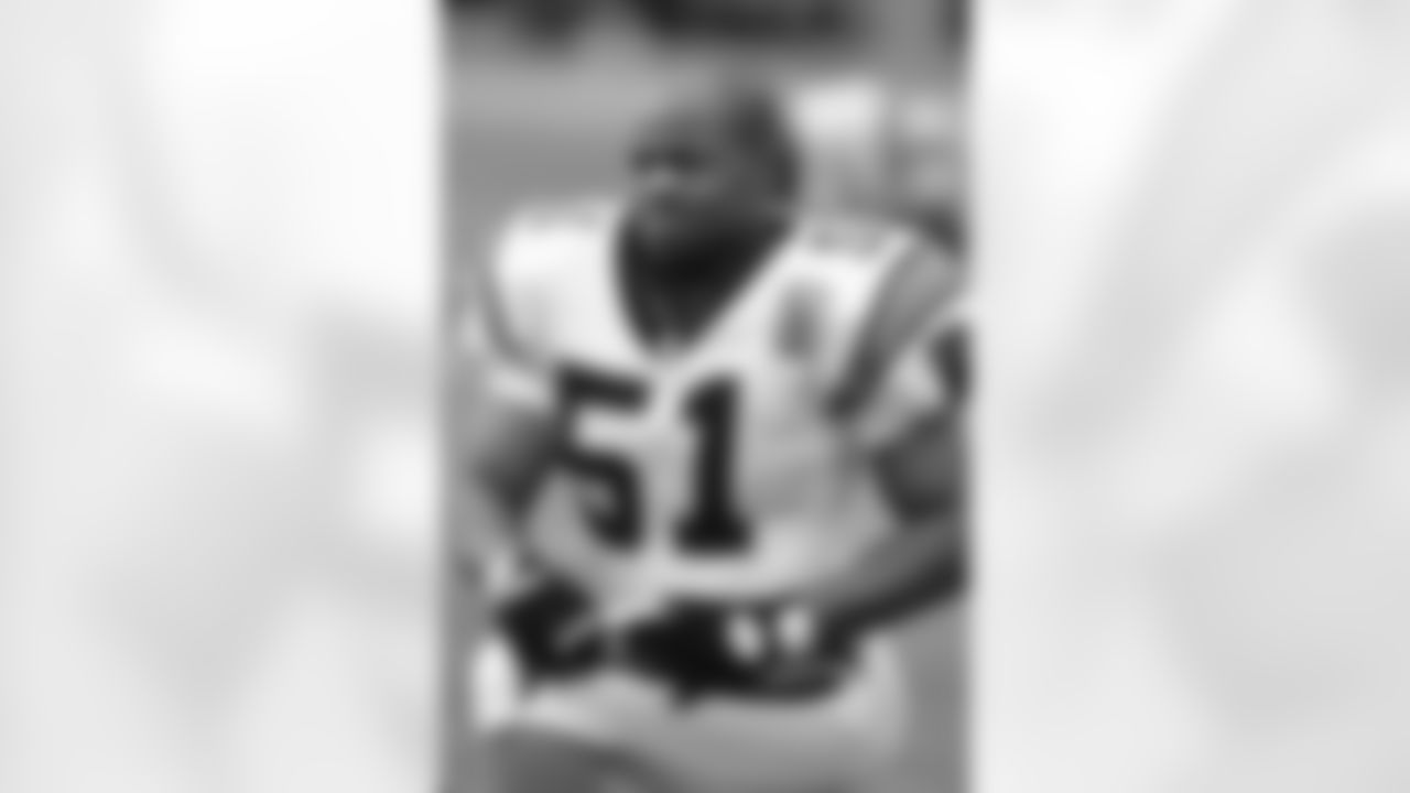 Sam Mills played for Carolina from 1995-97, then served as an assistant coach from 1998-2004.