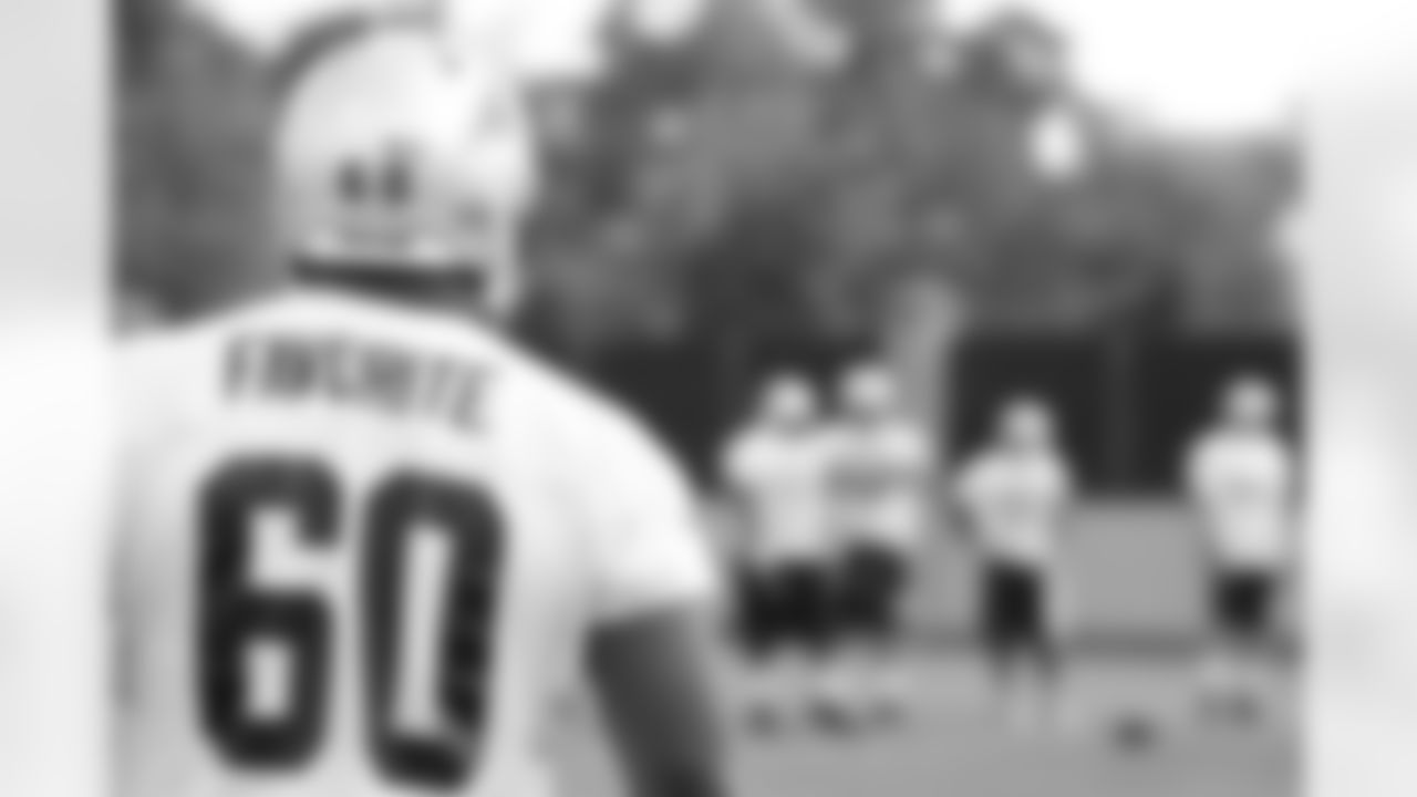 The rookie defensive tackle watches the action from the sideline; June 8, 2009 at OTAs.
