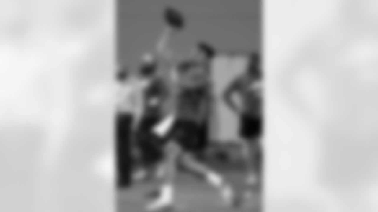 Ohio State quarterback Justin Fields throws as part of a drill during an NFL Pro Day at Ohio State University on Tuesday, March 30, 2021, in Columbus, Ohio. (AP Photo/Paul Vernon)