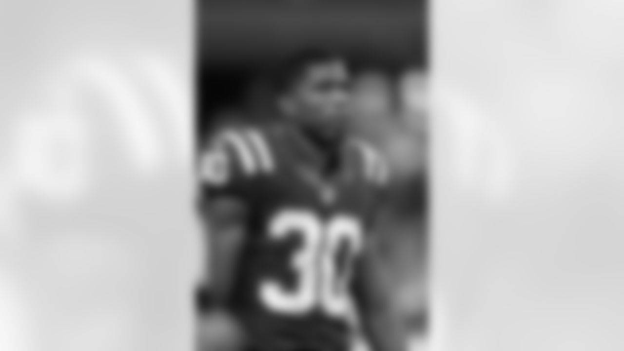 Indianapolis Colts defensive back Rashaan Melvin (30) looks up from the sideline with his hemet off during a NFL football game against the Houston Texans, Sunday, December 11, 2016 in Indianapolis. The Texans won the game 22-17. (Paul Jasienski via AP)