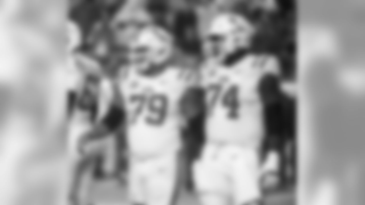 Mississippi linemen Javon Patterson (79) and Greg Little (74) line up against Arkansas during an NCAA college football game Saturday, Oct. 13, 2018, in Little Rock, Ark. (AP Photo/Michael Woods)