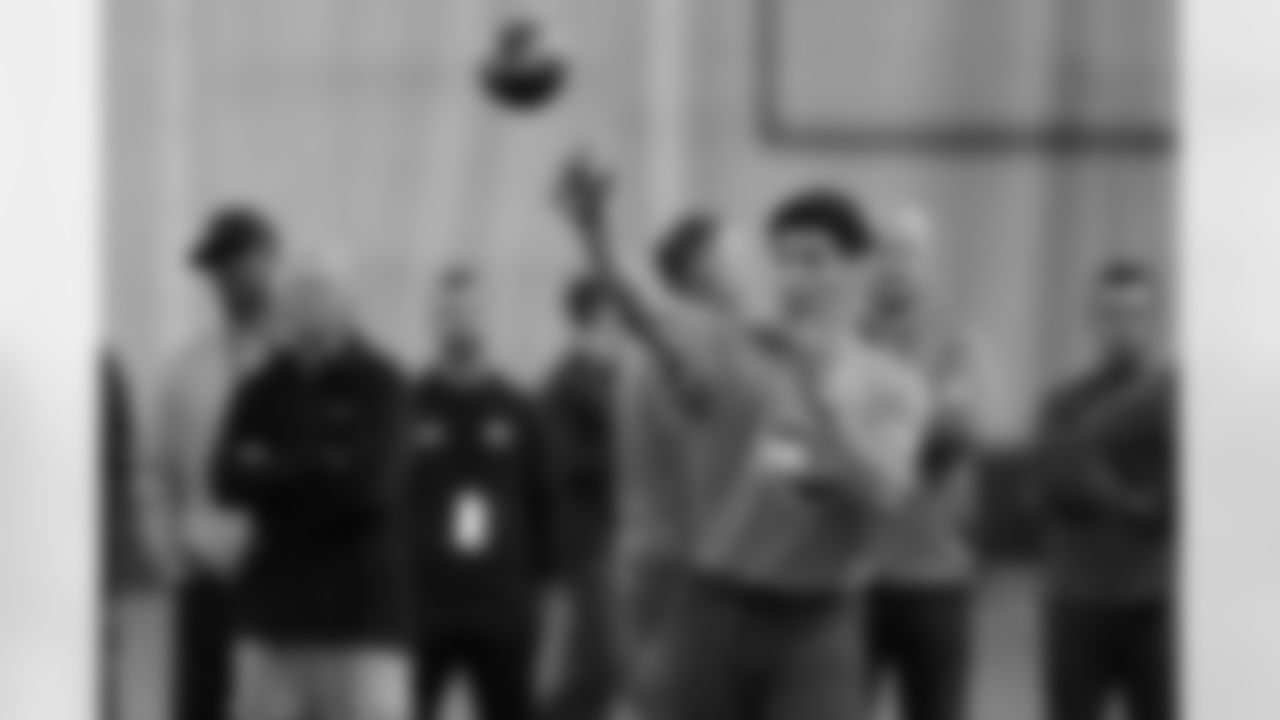 Quarterback Matt Corral passes during a drill at the Mississippi football pro day in Oxford, Miss., Wednesday, March 23, 2022. (AP Photo/Rogelio V. Solis)